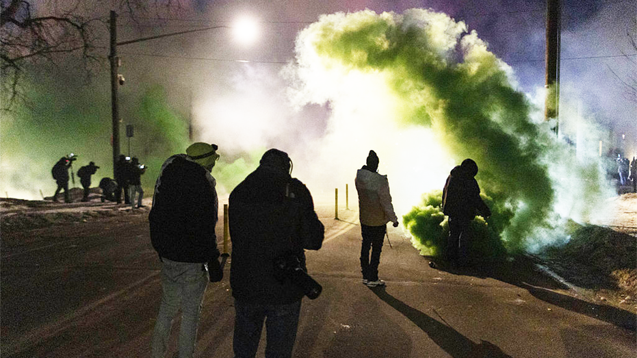 Federal officers deploy tear gas as protesters gather in Minneapolis after an ICE shooting