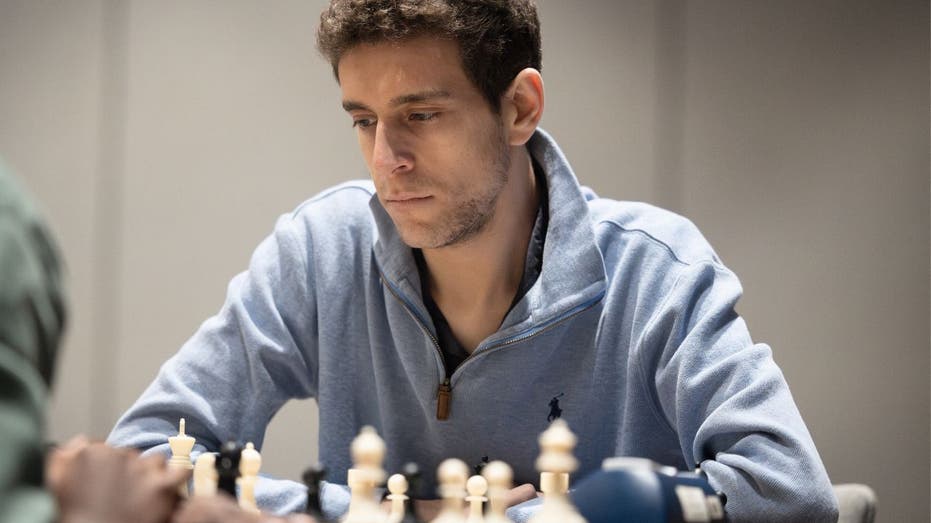 American chess grandmaster Daniel Naroditsky competing at a tournament.