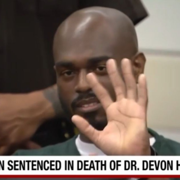 Inset: Dr. Devon Hoover (Verheyden Funeral Home). Background: Desmond Burks waves for the camera at his sentencing for murdering Hoover (WDIV). - Mediaite